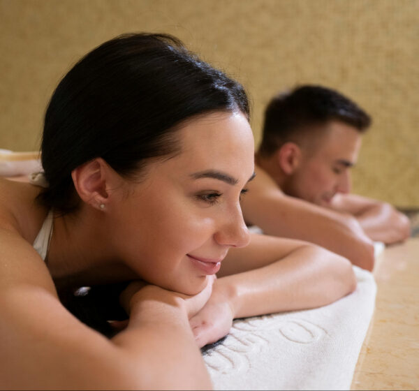 Two People Having Couples Massage